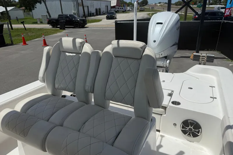 Slide: The Image of 2019 Blue Wave 2800 Pure Hybrid boat with luxurious seating and powerful outboard motor. - 54