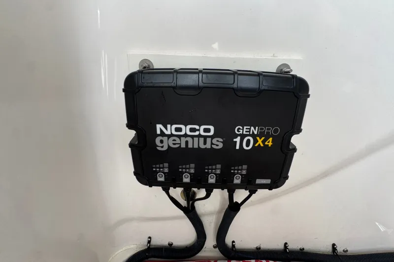 Slide: The Image of NOCO Genius GENPRO 10X4 charger installed on 2019 Blue Wave 2800 Pure Hybrid boat. - 51