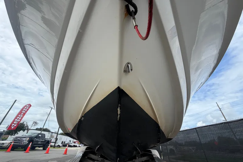 Slide: The Image of 2019 Robalo 226 Cayman boat hull, close-up view from below. - 11