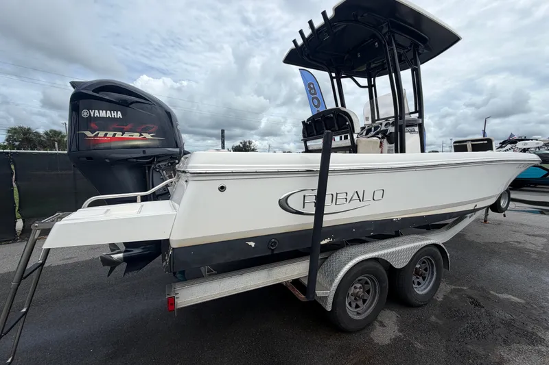 Slide: The Image of 2019 Robalo 226 Cayman boat on trailer with Yamaha VMAX engine. - 2
