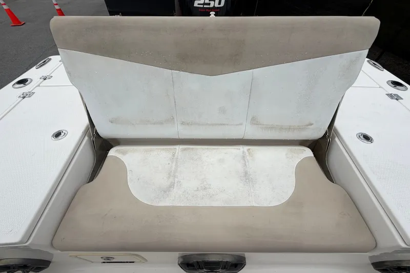 Slide: The Image of Rear seating area of a 2019 Robalo 226 Cayman boat, showing wear and tear. - 67