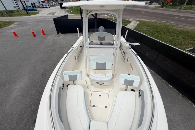 Slide: The Image of 2019 Robalo R222 Center Console boat with spacious seating and sleek design. - 46