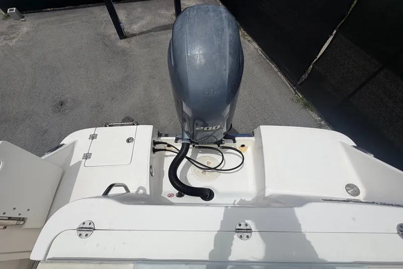 Slide: The Image of 2019 Robalo R222 Center Console boat with outboard motor, viewed from above. - 68