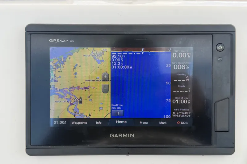 Slide: The Image of Garmin GPSMAP X5 display on 2019 Robalo R222 Center Console boat, showing navigation data. - 25