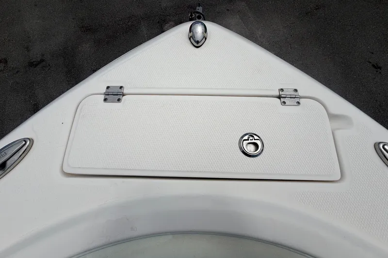 Slide: The Image of The image shows the bow deck of a 2019 Robalo R222 Center Console boat. - 40