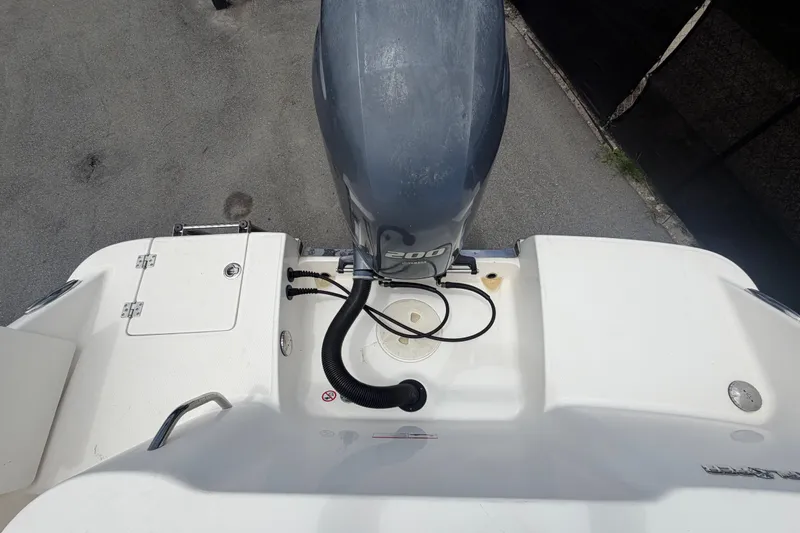 Slide: The Image of 2019 Robalo R222 Center Console boat with outboard motor, viewed from above. - 69