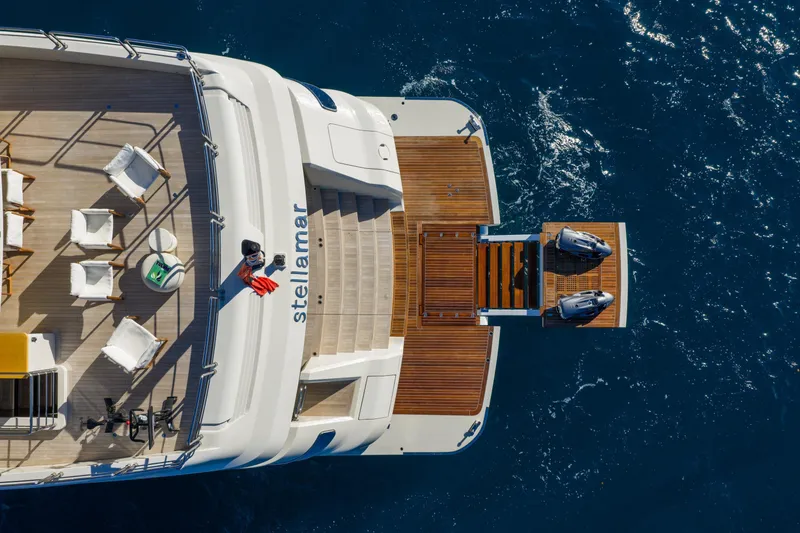 Slide: The Image of Aerial view of 2023 Cantiere Delle Marche RJ 115 yacht with deck and sea. - 7