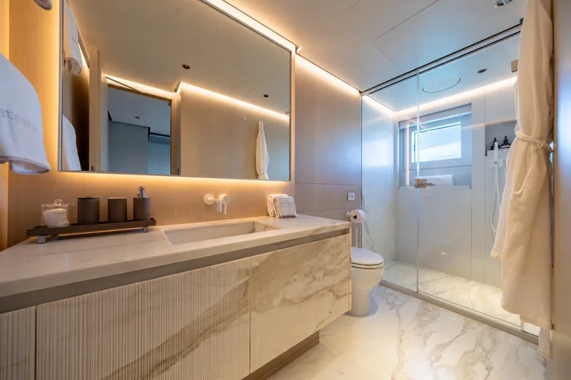 Slide: The Image of Luxurious bathroom on 2023 Cantiere Delle Marche RJ 115 yacht, featuring marble finishes and modern design. - 35