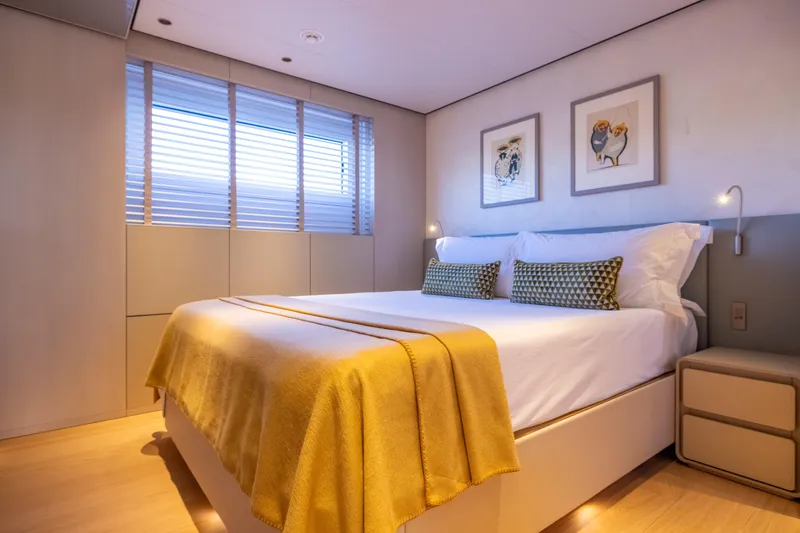 Slide: The Image of Luxurious bedroom interior on 2023 Cantiere Delle Marche RJ 115 yacht, featuring modern decor. - 23