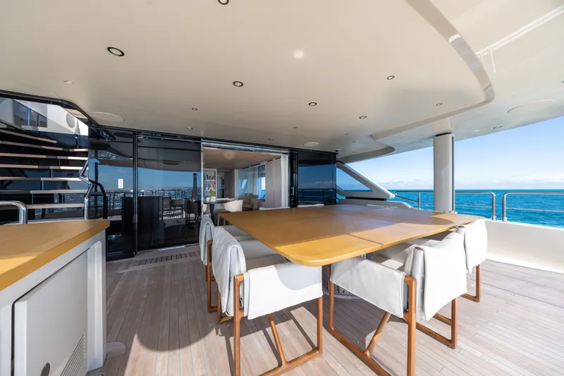 Slide: The Image of Luxurious 2023 Cantiere Delle Marche RJ 115 yacht deck with elegant dining area. - 55