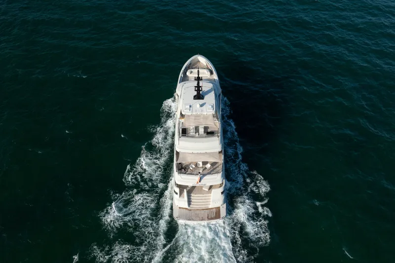 Slide: The Image of Aerial view of 2023 Cantiere Delle Marche RJ 115 yacht cruising on open sea. - 4