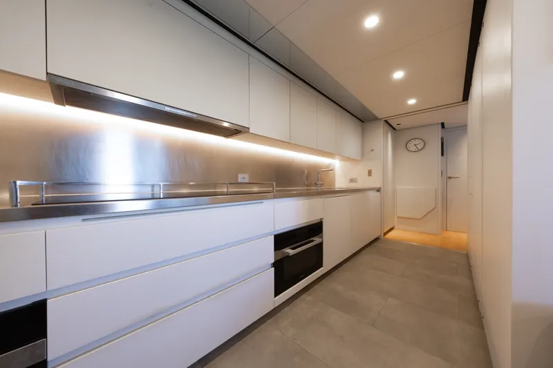 Slide: The Image of Modern kitchen interior on Cantiere Delle Marche RJ 115 yacht, 2023 model. - 31