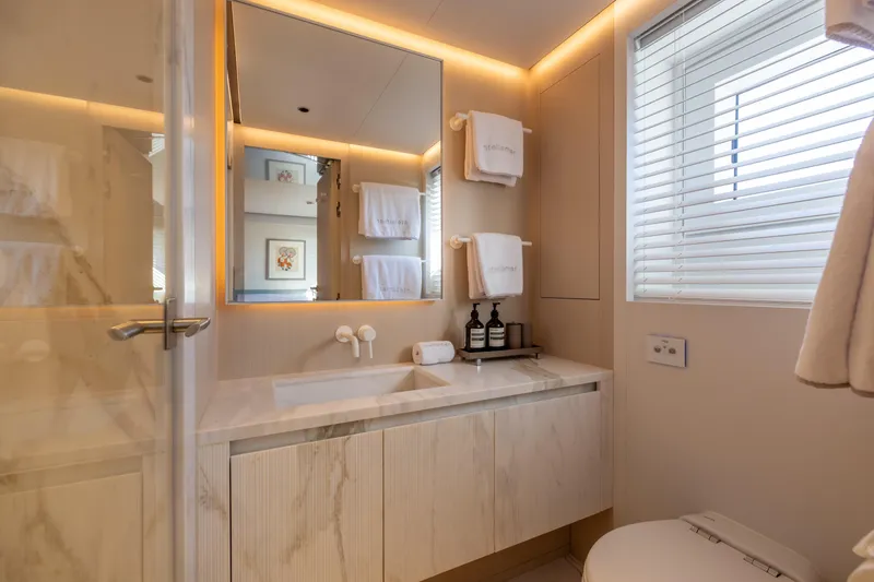 Slide: The Image of Luxurious bathroom in 2023 Cantiere Delle Marche RJ 115 yacht, featuring elegant design and modern amenities. - 26