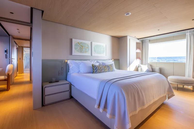 Slide: The Image of Luxurious bedroom interior of 2023 Cantiere Delle Marche RJ 115 yacht with ocean view. - 17