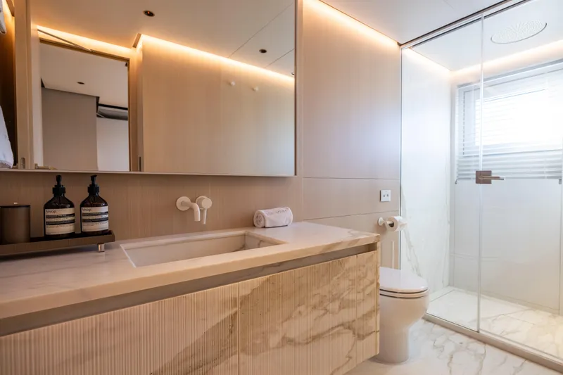 Slide: The Image of Luxurious bathroom in 2023 Cantiere Delle Marche RJ 115 yacht, featuring modern design and marble finishes. - 22