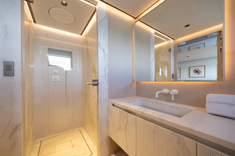Slide: The Image of Luxurious bathroom on 2023 Cantiere Delle Marche RJ 115 yacht, featuring modern shower and elegant sink. - 42