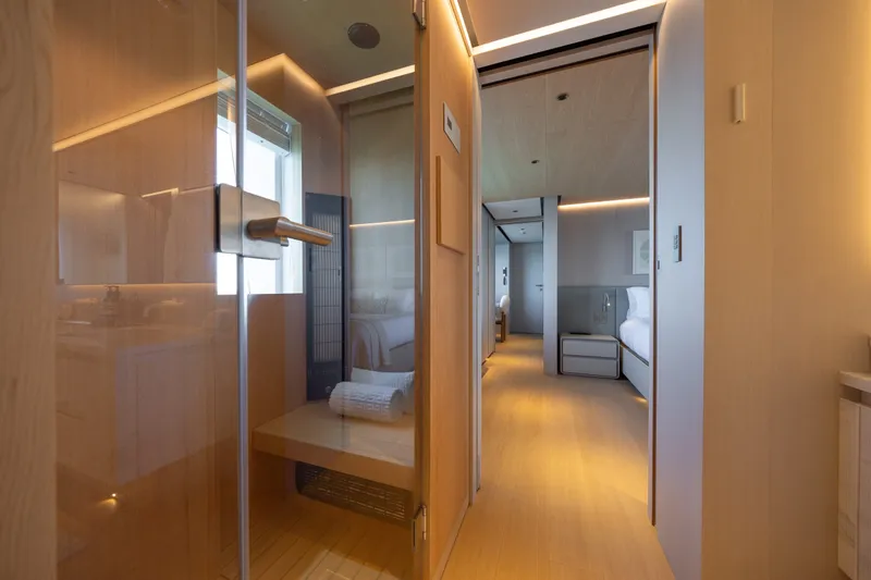 Slide: The Image of Luxurious interior of 2023 Cantiere Delle Marche RJ 115 yacht, featuring modern design and elegant wood finishes. - 29