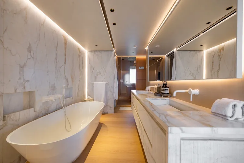 Slide: The Image of Luxurious marble bathroom in 2023 Cantiere Delle Marche RJ 115 yacht, featuring modern fixtures and elegant lighting. - 28