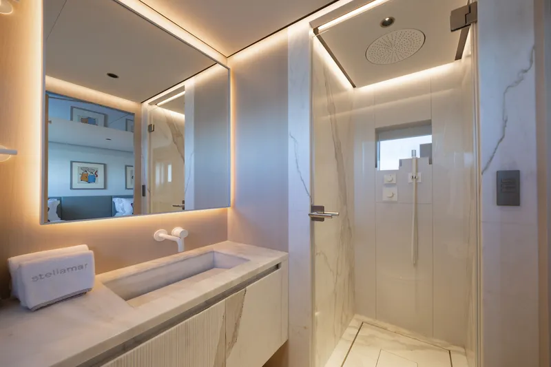 Slide: The Image of Luxurious bathroom on 2023 Cantiere Delle Marche RJ 115 yacht, featuring modern shower and elegant sink. - 46
