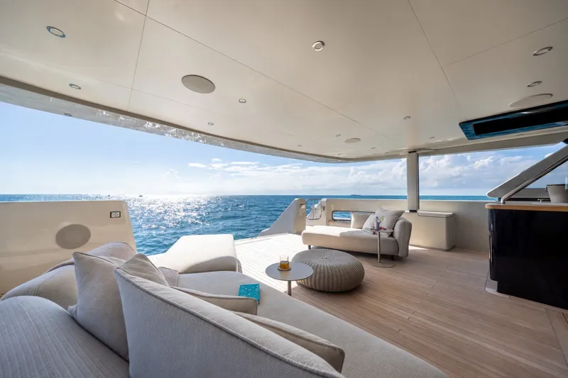 Slide: The Image of Luxurious 2023 Cantiere Delle Marche RJ 115 yacht deck with ocean view and elegant seating. - 14