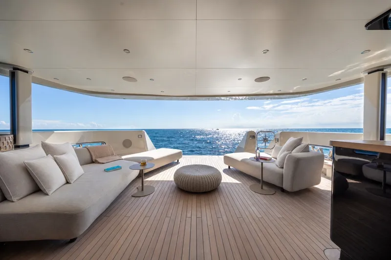 Slide: The Image of Luxurious 2023 Cantiere Delle Marche RJ 115 yacht deck with ocean view and elegant seating. - 13