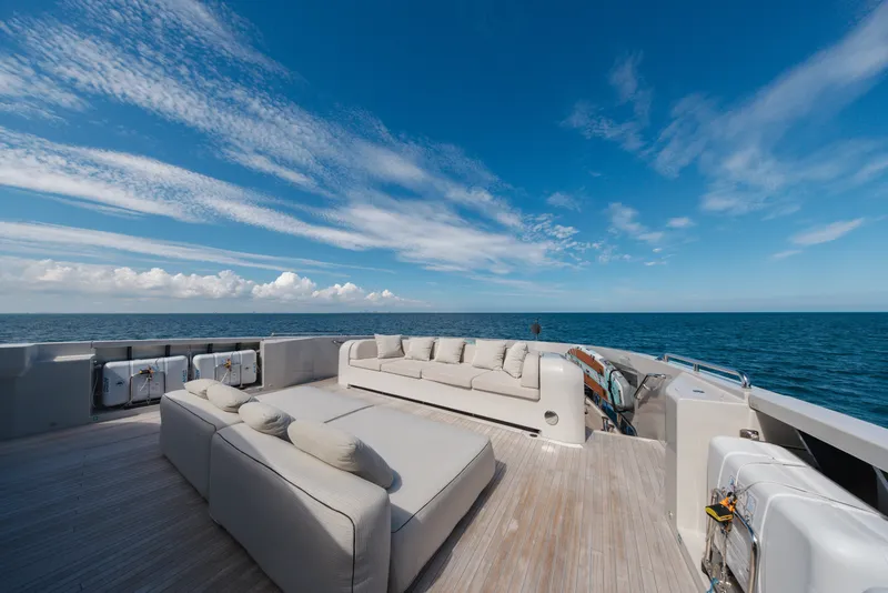 Slide: The Image of Luxurious 2023 Cantiere Delle Marche RJ 115 yacht deck with ocean view and plush seating. - 60