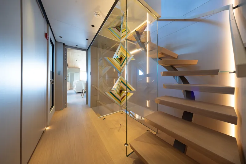 Slide: The Image of Modern interior of 2023 Cantiere Delle Marche RJ 115 yacht with sleek staircase design. - 23