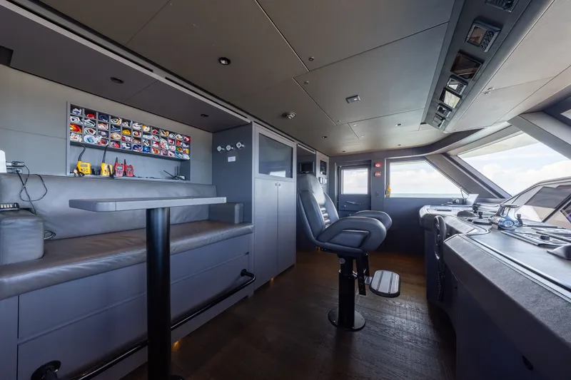 Slide: The Image of Modern helm station of 2023 Cantiere Delle Marche RJ 115 yacht, featuring sleek design and advanced controls. - 57