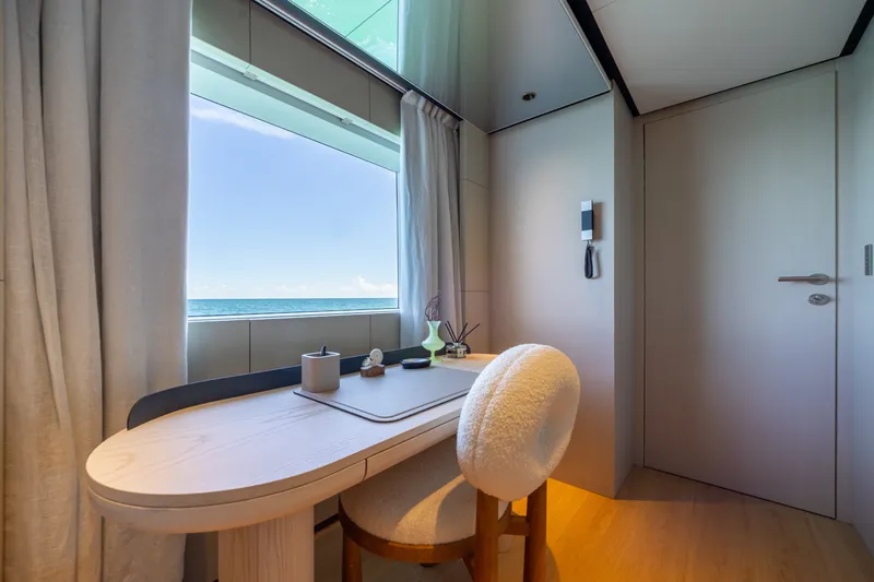 Slide: The Image of Luxurious interior of 2023 Cantiere Delle Marche RJ 115 yacht with ocean view. - 26