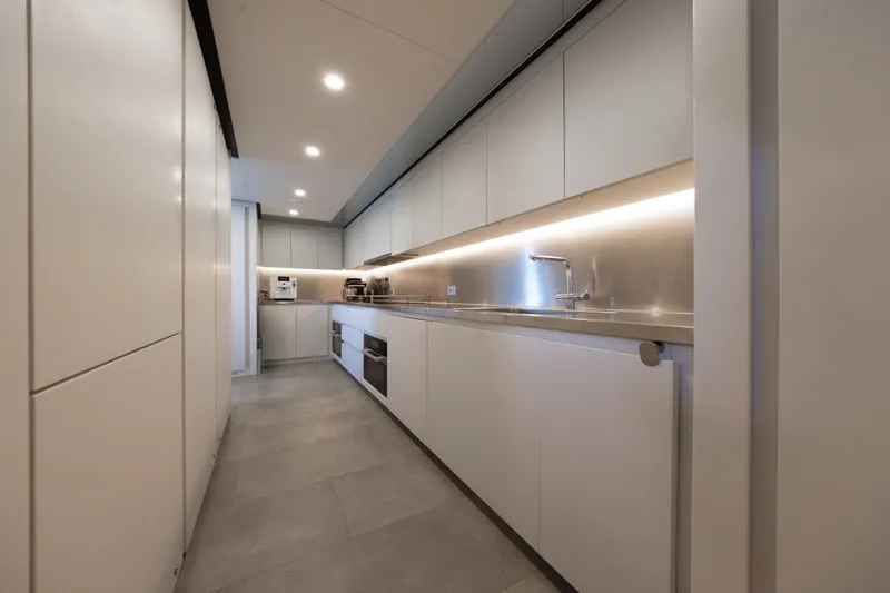 Slide: The Image of Modern kitchen interior on Cantiere Delle Marche RJ 115 yacht, 2023 model. - 30