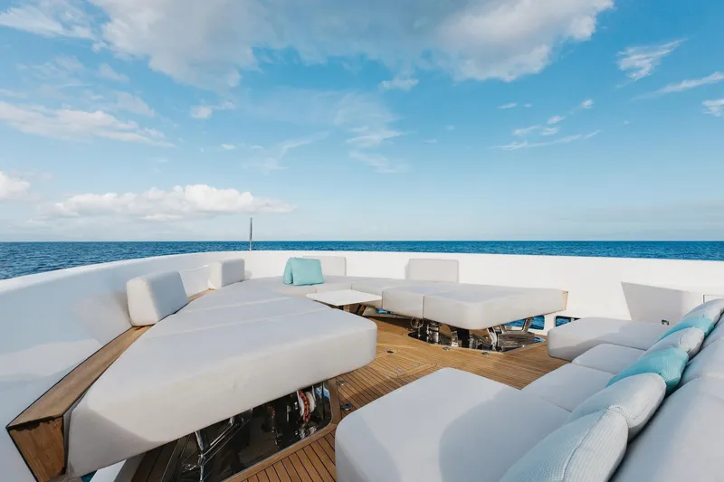 Slide: The Image of Luxurious Sanlorenzo SLA120A yacht deck with modern seating, ocean view, and blue sky, 2020 model. - 38