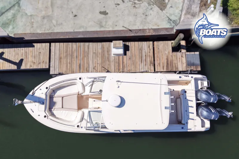 Slide: The Image of Aerial view of 2014 Grady-White Freedom 275 boat docked at a marina. - 16