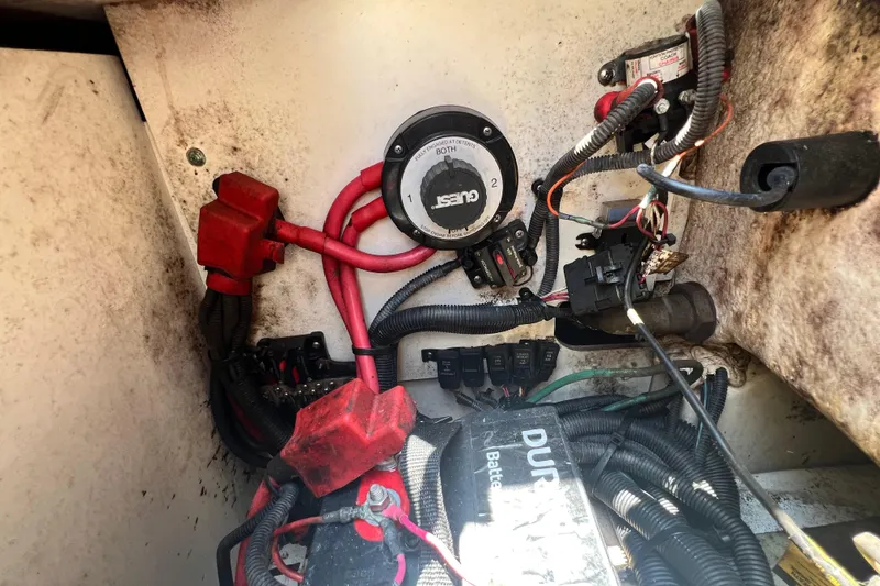 Slide: The Image of Electrical wiring and battery setup in a 2019 Sea Ray SDX 270 Outboard boat. - 104