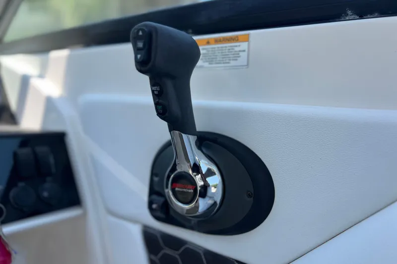 Slide: The Image of Throttle control lever on a 2019 Sea Ray SDX 270 Outboard boat. - 86