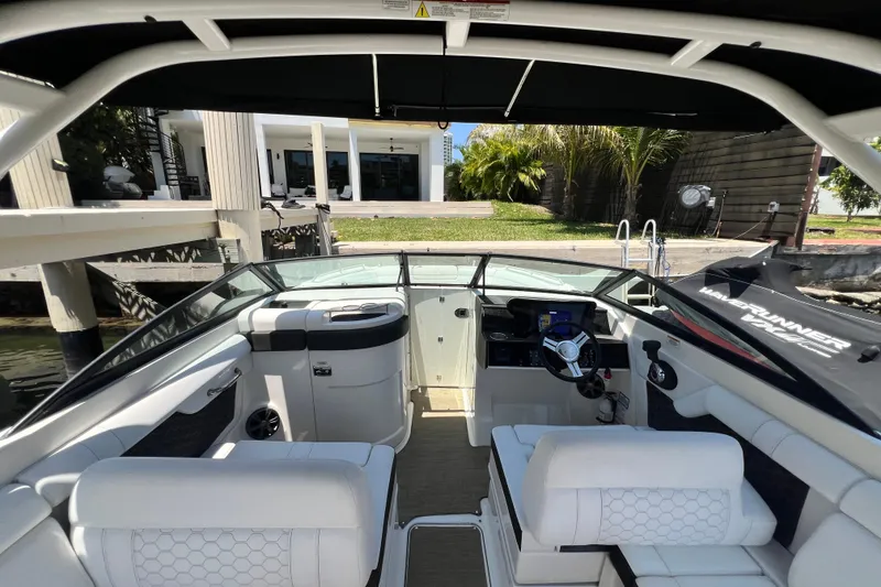 Slide: The Image of 2019 Sea Ray SDX 270 Outboard boat interior with modern helm and seating. - 71