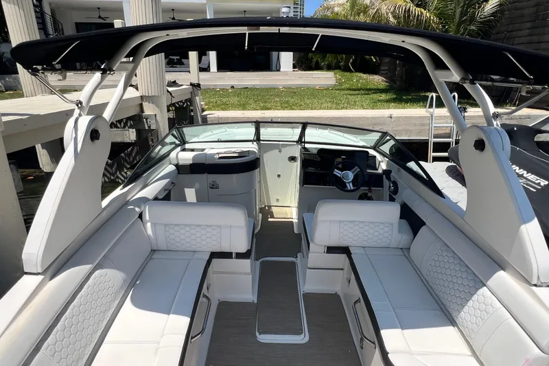Slide: The Image of 2019 Sea Ray SDX 270 Outboard boat interior with luxurious seating and modern design. - 72