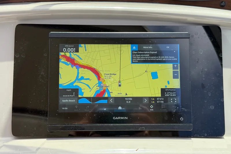 Slide: The Image of Garmin GPS display on 2008 Chaparral Signature 290, showing navigation map and chart subscription alert. - 34