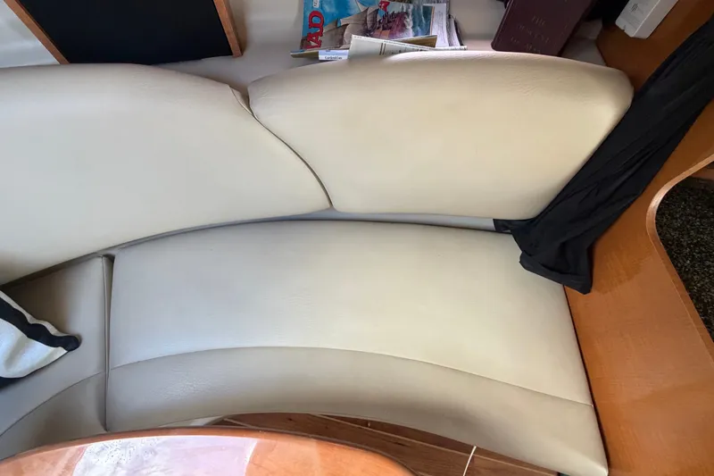 Slide: The Image of Interior seating of 2008 Chaparral Signature 290 boat with beige upholstery. - 62