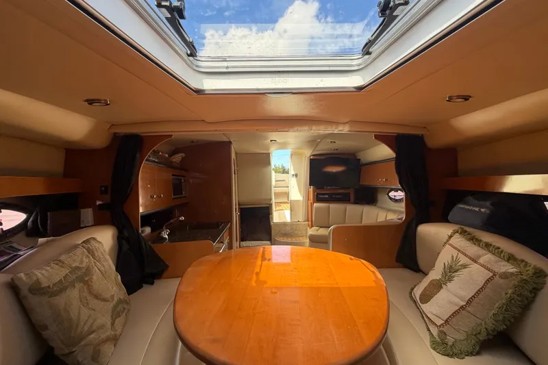 Slide: The Image of Interior of 2008 Chaparral Signature 290 yacht with skylight and cozy seating area. - 66