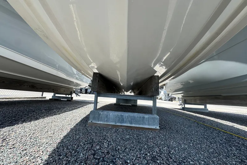 Slide: The Image of 2008 Chaparral Signature 290 boat hull on dry dock, viewed from below. - 11