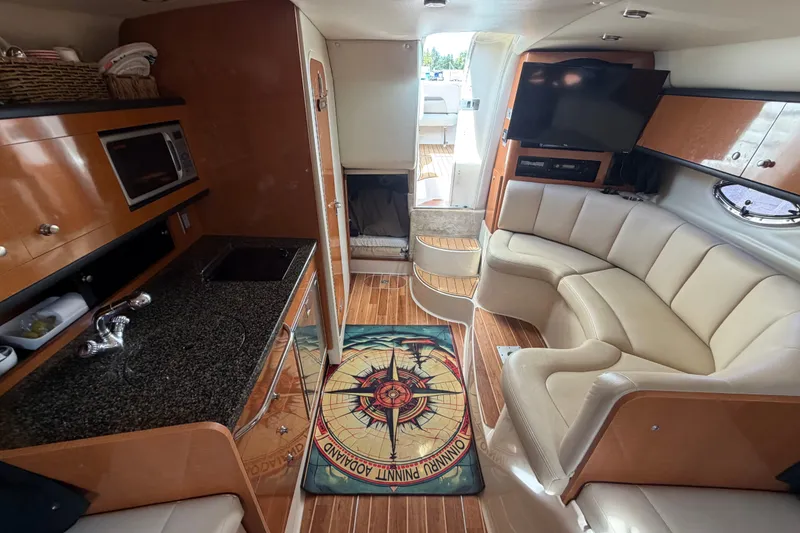 Slide: The Image of Luxurious interior of 2008 Chaparral Signature 290 yacht with modern amenities and elegant design. - 70