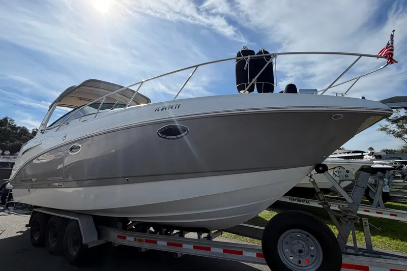Slide: The Image of 2008 Chaparral Signature 290 boat on trailer under sunny sky. - 8