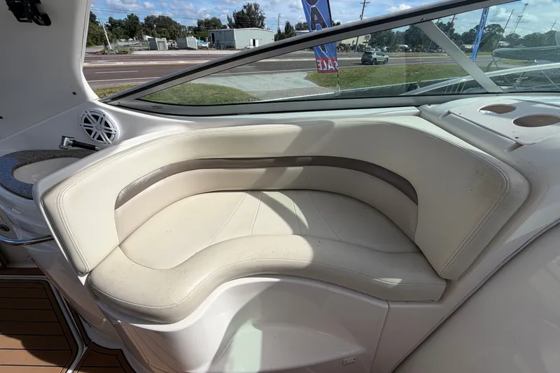 Slide: The Image of 2008 Chaparral Signature 290 boat interior with curved seating and cup holders. - 26