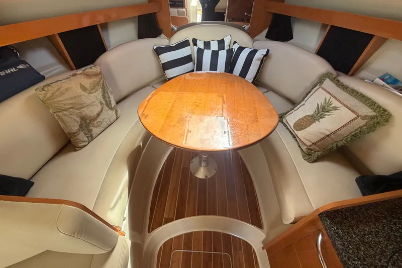 Slide: The Image of 2008 Chaparral Signature 290 interior with cozy seating and decorative pillows. - 61