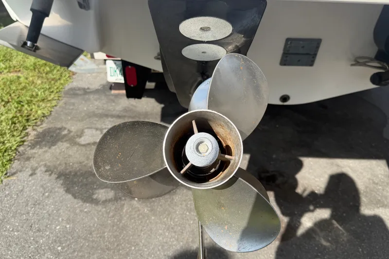 Slide: The Image of Propeller of a 2008 Chaparral Signature 290 boat on pavement. - 4
