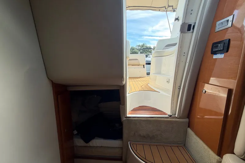 Slide: The Image of Interior view of 2008 Chaparral Signature 290 yacht, showing cabin and deck access. - 29