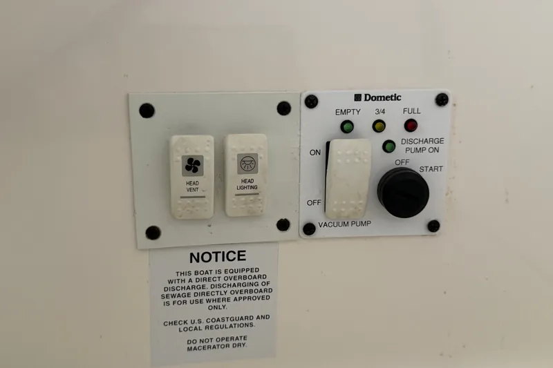 Slide: The Image of Control panel on a 2008 Chaparral Signature 290 boat with Dometic system. - 87