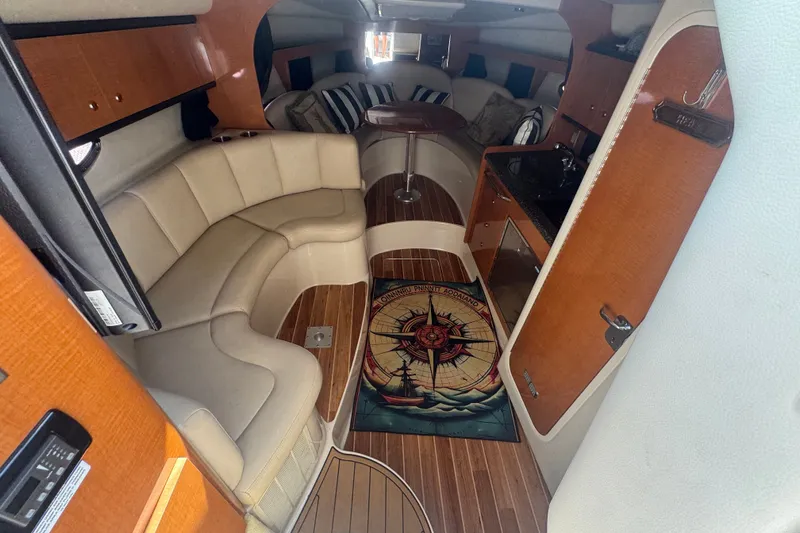 Slide: The Image of Luxurious 2008 Chaparral Signature 290 cabin interior with plush seating and elegant wood finishes. - 22
