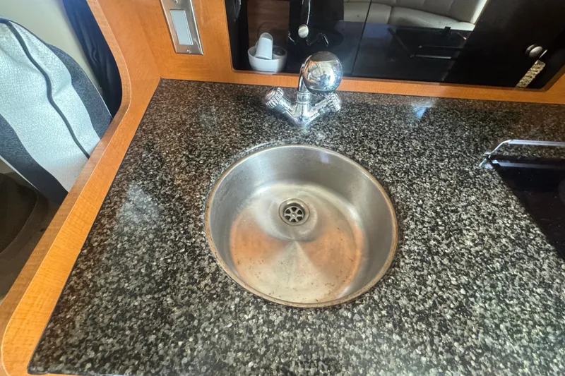 Slide: The Image of Granite countertop with round sink in 2008 Chaparral Signature 290 boat. - 30