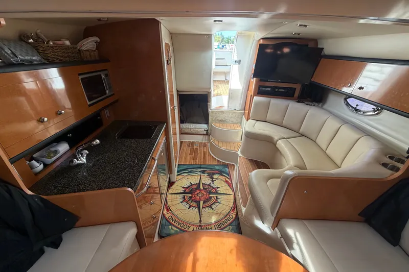 Slide: The Image of Luxurious interior of 2008 Chaparral Signature 290 yacht with modern amenities and elegant seating. - 69